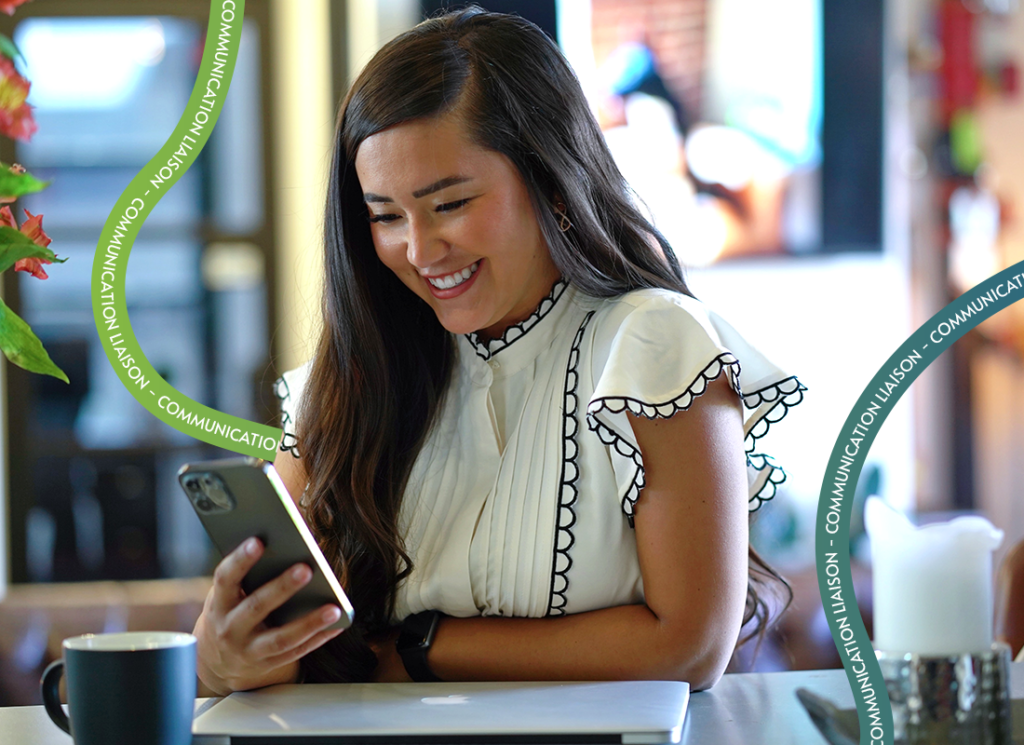 Cheyenne smiling communicating with client on cell phone