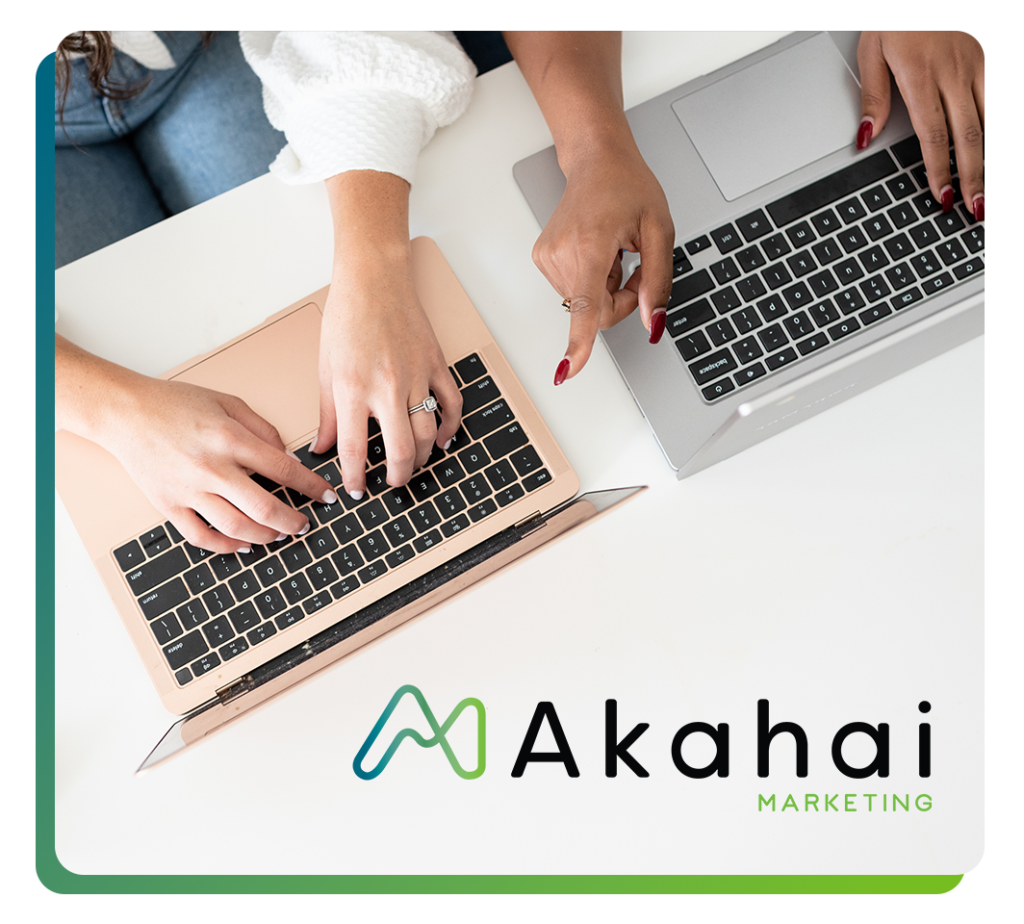 aerial photo of two women working on laptops